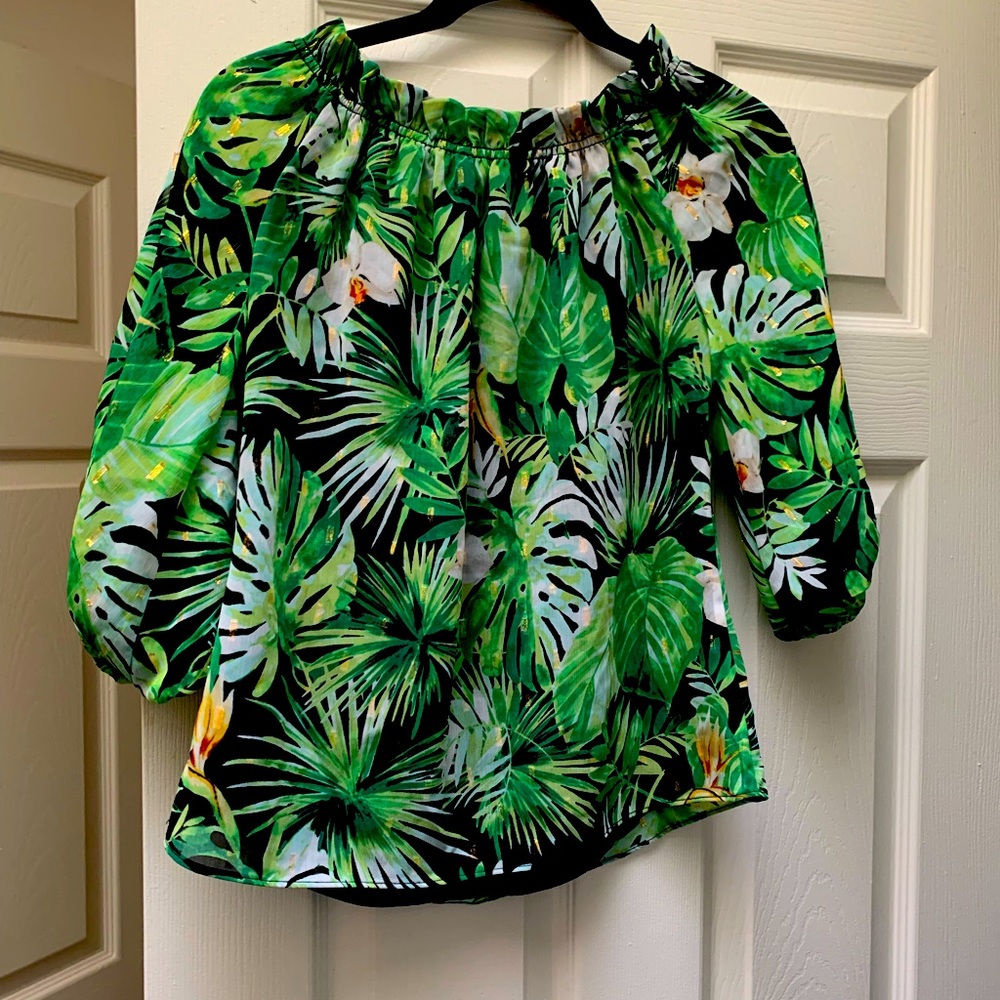 Whbm never worn before along with tags attached. It’s an off the shoulders
